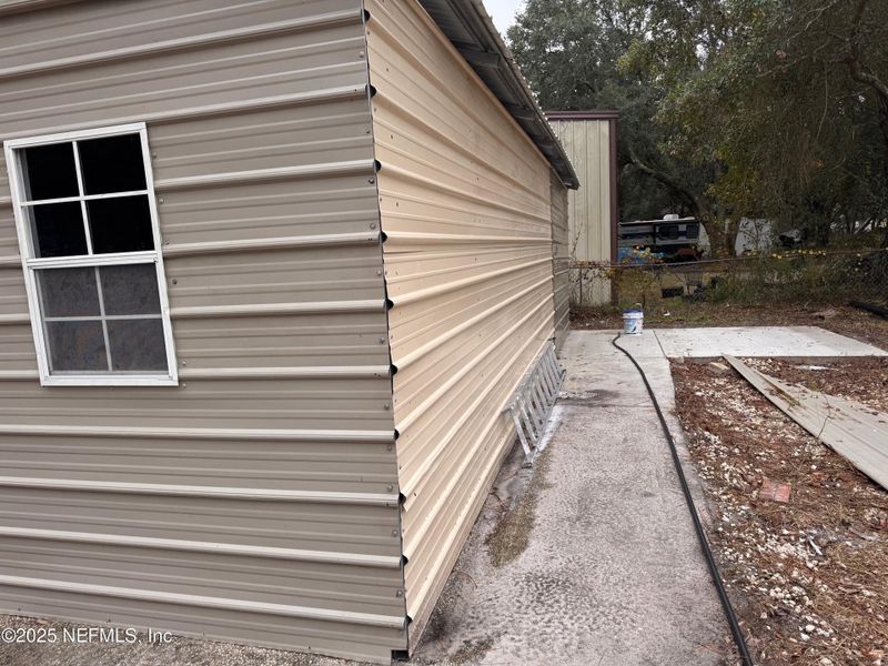 Exterior details and patio area of a home in , Fernandina Beach (Image 20).