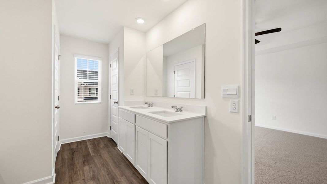 Furnished interior view inside a new home in Inverness at Sugarloaf, Lawrenceville (Image 13). Furnished interior view inside a new home in Inverness at Sugarloaf, Lawrenceville (Image 13).