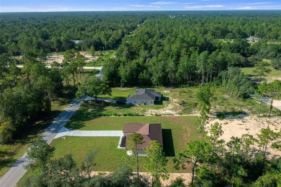 Front exterior of a new home in , Dunnellon, FL, highlighting curb appeal (Image 27).