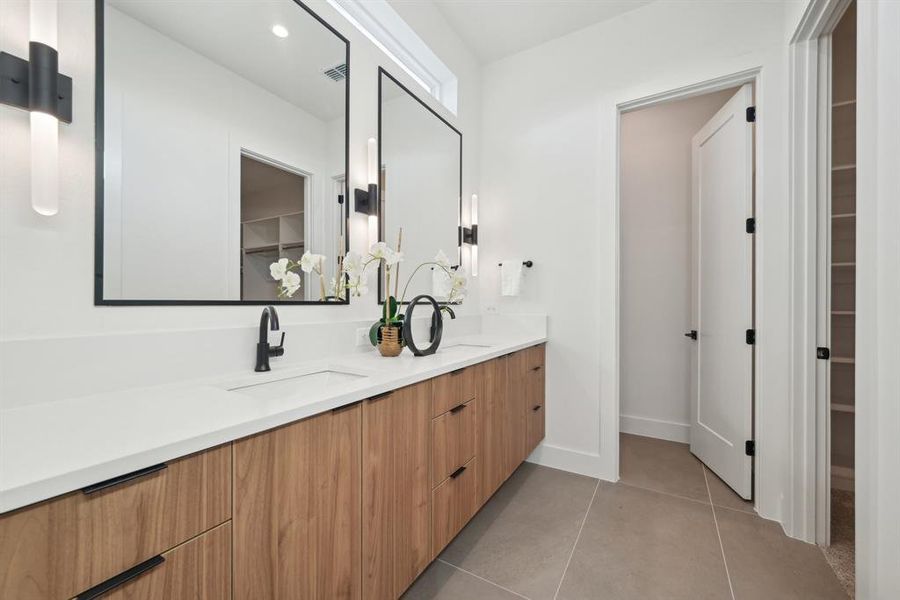 Bathroom with vanity and tile patterned flooring