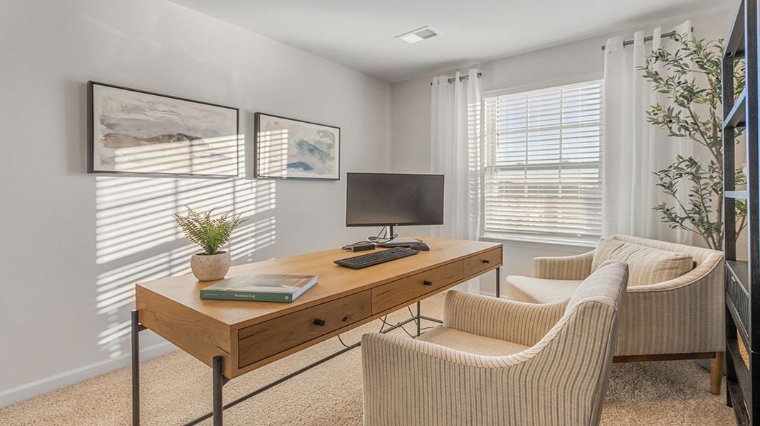 Representative furnished interior of a home built from the Maywood by D.R. Horton in The Gables at Edinborough Townes, Gibsonville (Image 21).