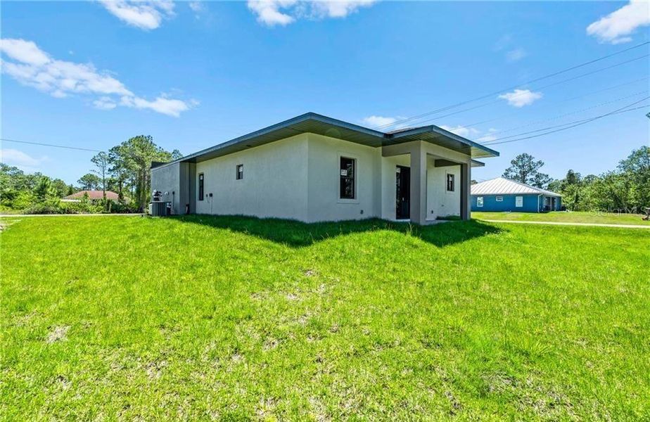Exterior details and patio area of a home in , Lehigh Acres (Image 33).