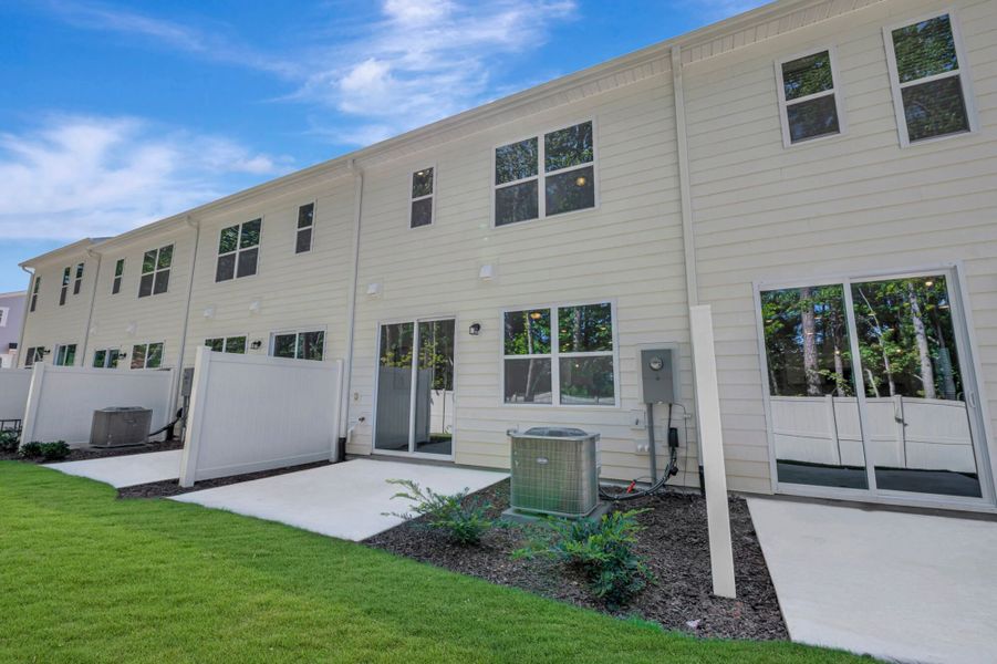 Exterior details and patio area of a home in Ashmore Townes, Garner (Image 3).