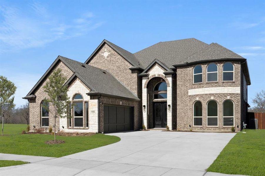 Front exterior of a new home in High Country, Burleson, TX, highlighting curb appeal (Image 24).