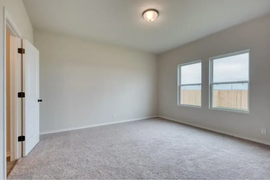 Representative unfurnished interior of a home built from the Brodie by Ashton Woods in Saddlebrook Ranch, Schertz (Image 12).