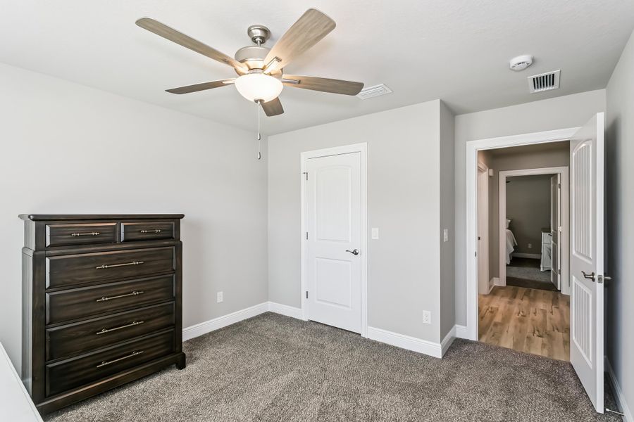 Representative unfurnished interior of a home built from the The Liberty Estate by Herbst Homes in Prosperity Point, Milton (Image 24).