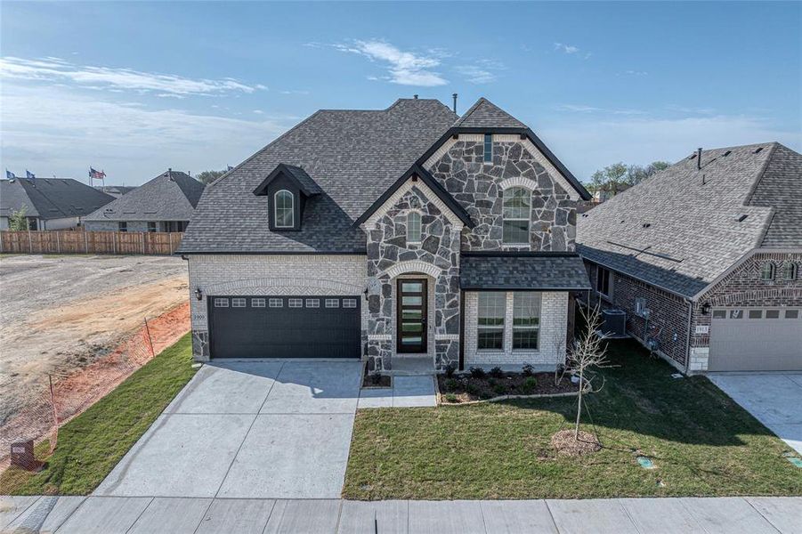 Front exterior of a new home in Meadow Vista, Anna, TX, highlighting curb appeal (Image 24).