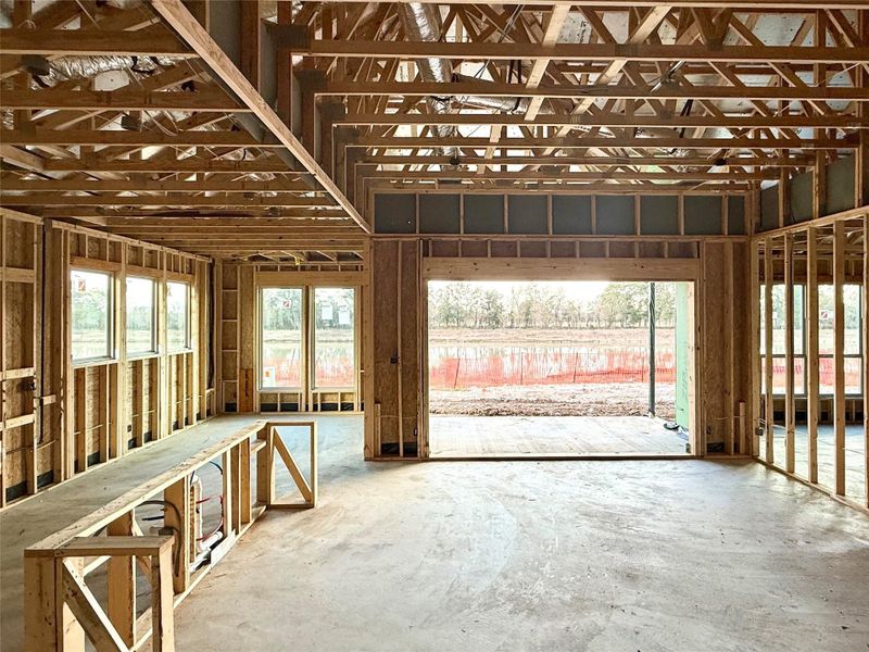 Imagine walking into a home that feels as expansive as it is inviting, bathed in natural light and framed by soaring ceilings that make every moment feel grand.