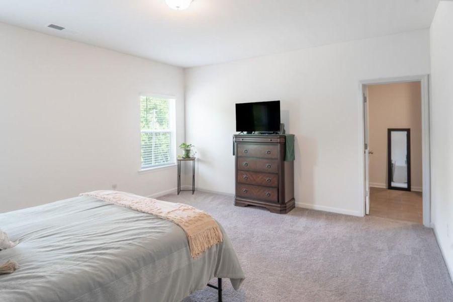 Furnished interior view inside a new home in Ellison Square, Sugar Hill (Image 23).