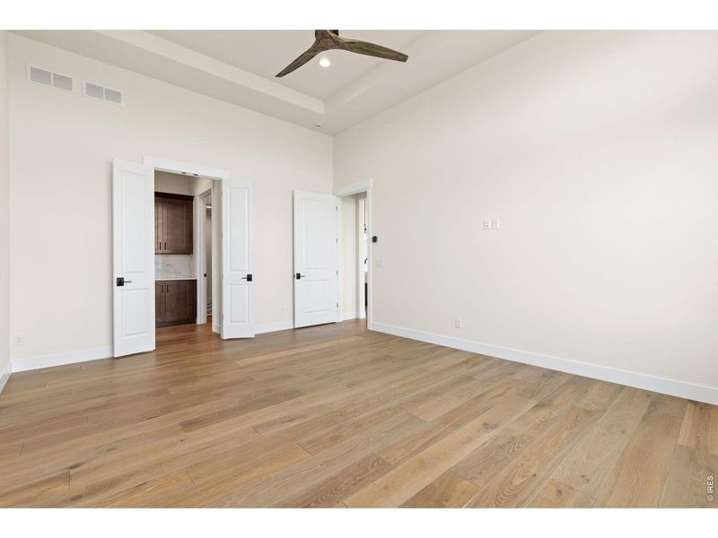 Spacious, unfurnished interior of a new home in RainDance, Windsor (Image 22).