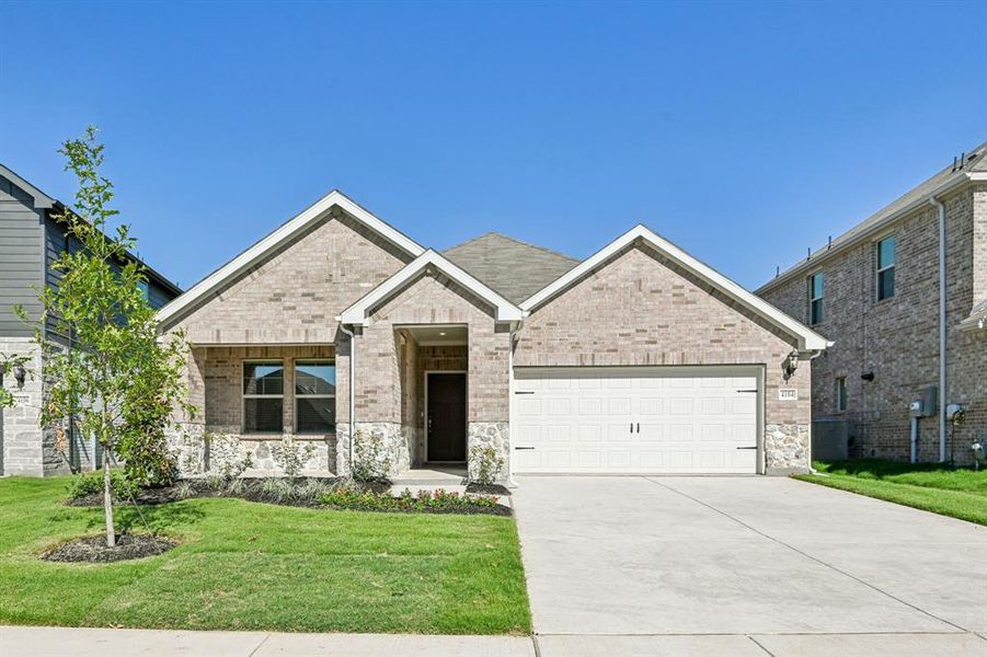 Front exterior of a new home in Lakehaven - Signature Series, Farmersville, TX, highlighting curb appeal (Image 1). Front exterior of a new home in Lakehaven - Signature Series, Farmersville, TX, highlighting curb appeal (Image 1).