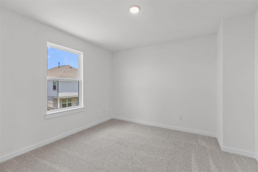 Spacious, unfurnished interior of a new home in Sunterra, Katy (Image 12).