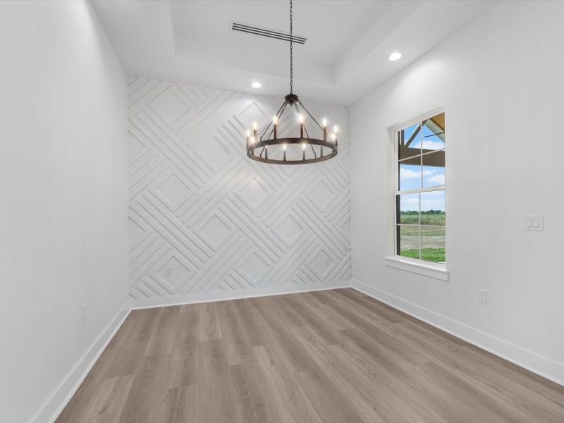 Dining space that oversees the backyard covered patio