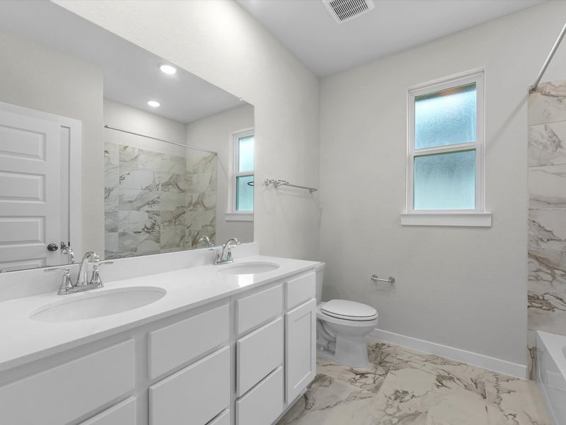 Furnished interior view inside a new home in Mason Woods, Cypress (Image 8).
