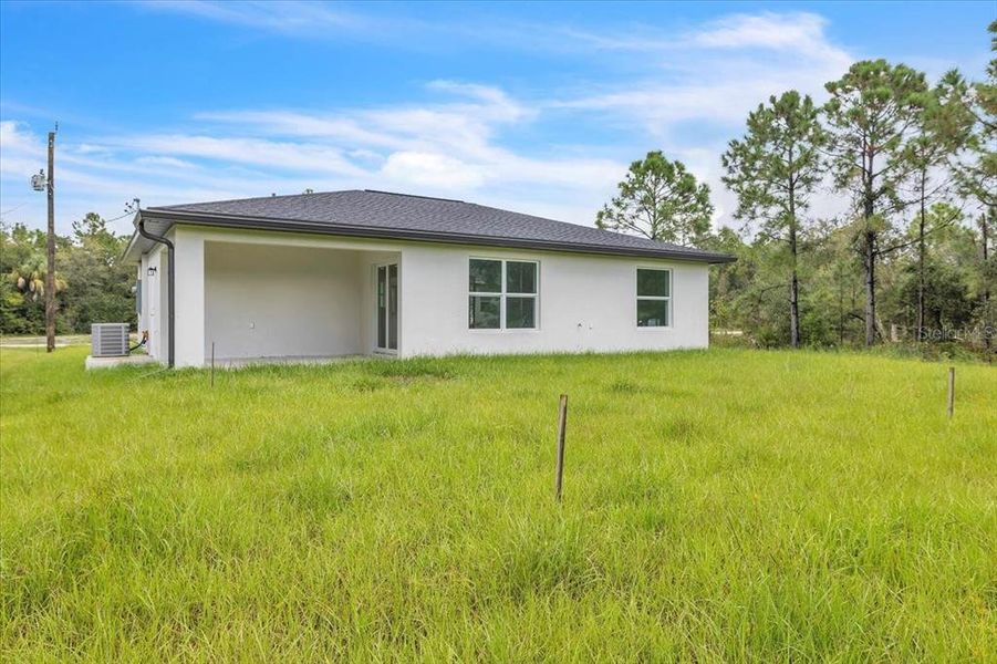 Front exterior of a new home in , Punta Gorda, FL, highlighting curb appeal (Image 18).