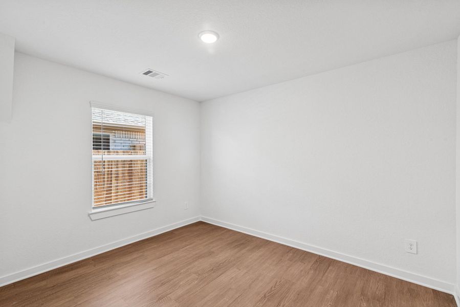 Spacious, unfurnished interior of a new home in Wildrye, Waller (Image 22).