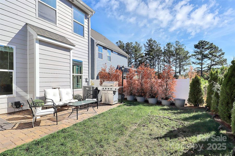 Exterior details and patio area of a home in McKee Grove, Charlotte (Image 2).