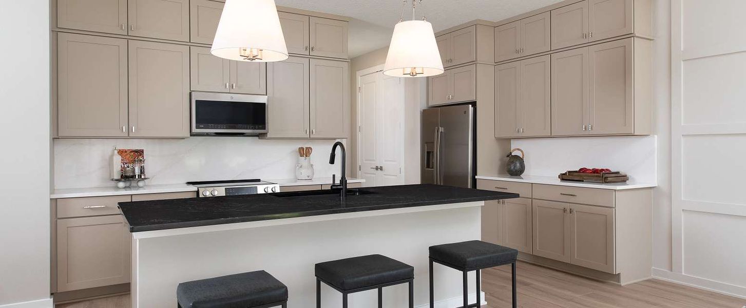Representative furnished interior of a home built from the Lassen by Ashton Woods in Tyson Reserve, St. Cloud (Image 7).