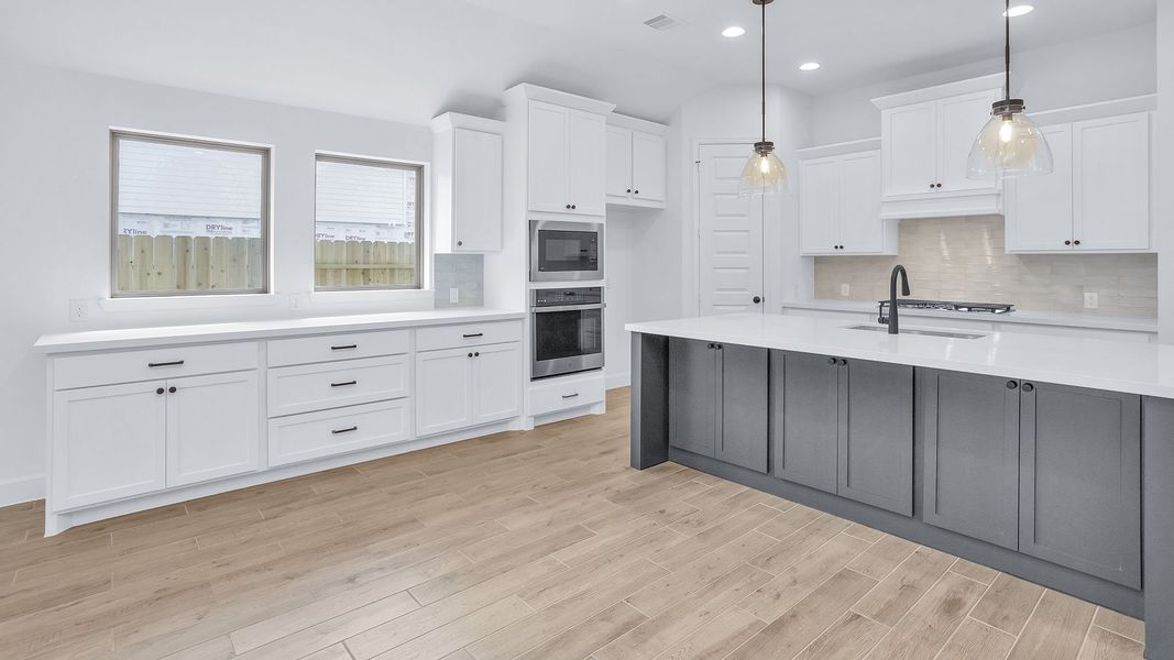 Furnished interior view inside a new home in Grand Central Park, Conroe (Image 9).