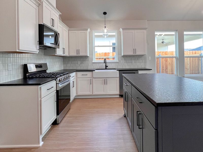 Furnished interior view inside a new home in TerraVista, Victoria (Image 4).
