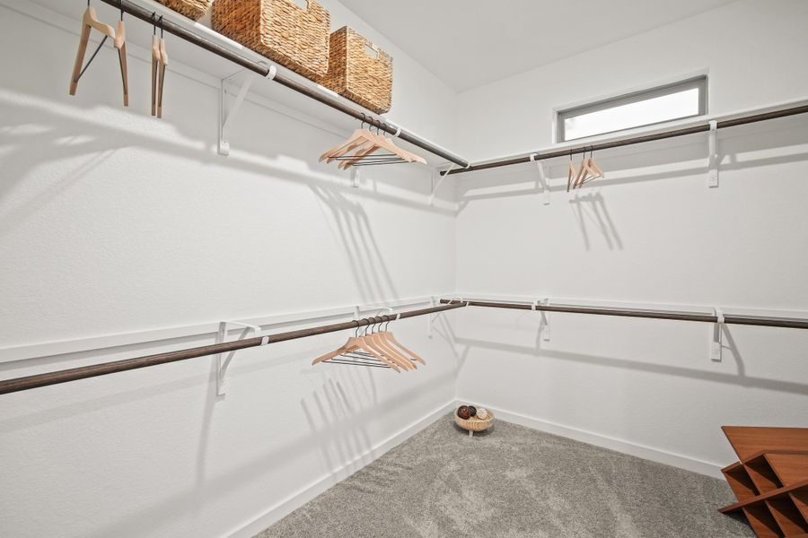 Primary Closet in the Oak home plan by Trophy Signature Homes – REPRESENTATIVE PHOTO