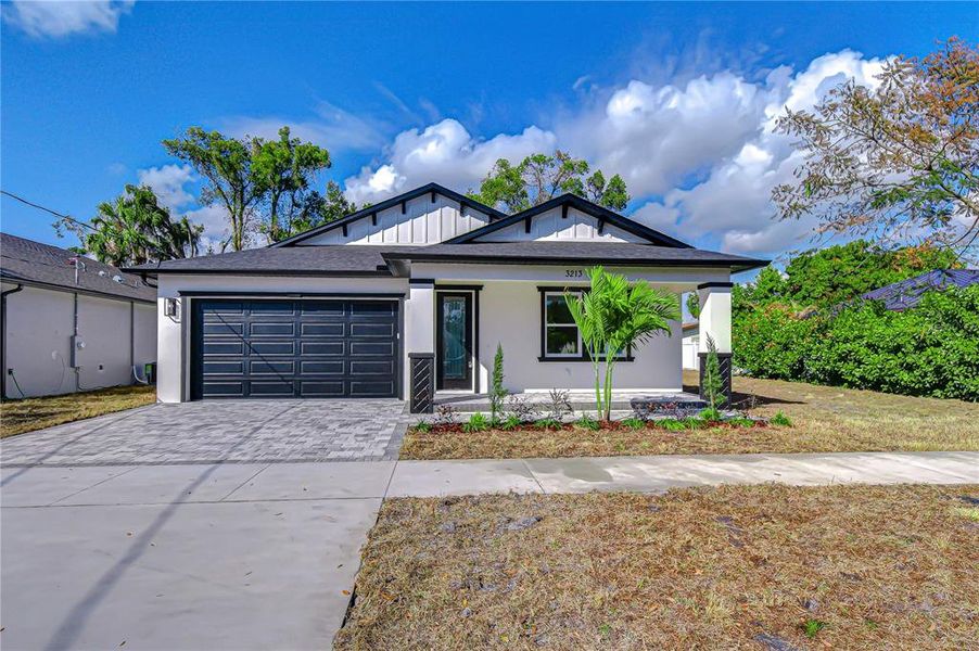Front exterior of a new home in , Tampa, FL, highlighting curb appeal (Image 1). Front exterior of a new home in , Tampa, FL, highlighting curb appeal (Image 1).