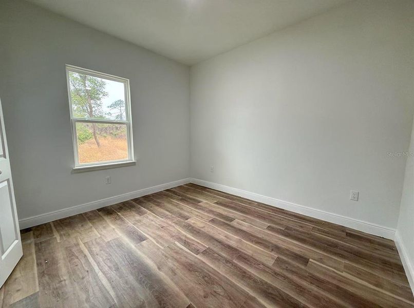 Spacious, unfurnished interior of a new home in , Port Charlotte (Image 12).