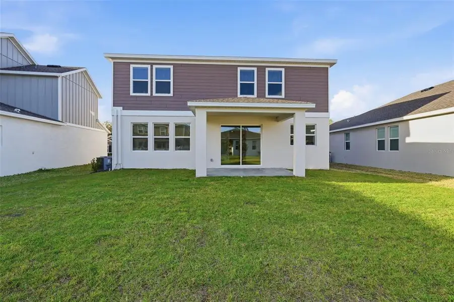 Exterior details and patio area of a home in , Debary (Image 3).
