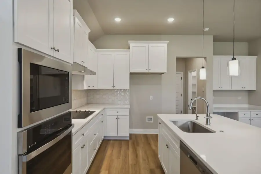 Representative furnished interior of a home built from the Addison by Chesmar Homes in Summer Crest, Crowley (Image 5).