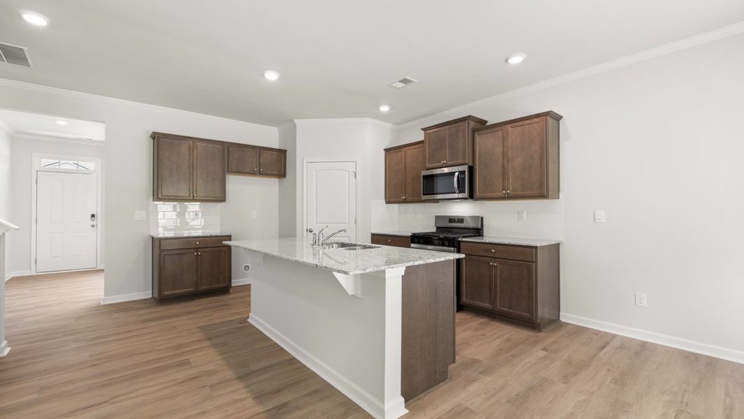 Representative furnished interior of a home built from the Hayden by D.R. Horton in Northwoods at Mirror Lake, Villa Rica (Image 7).
