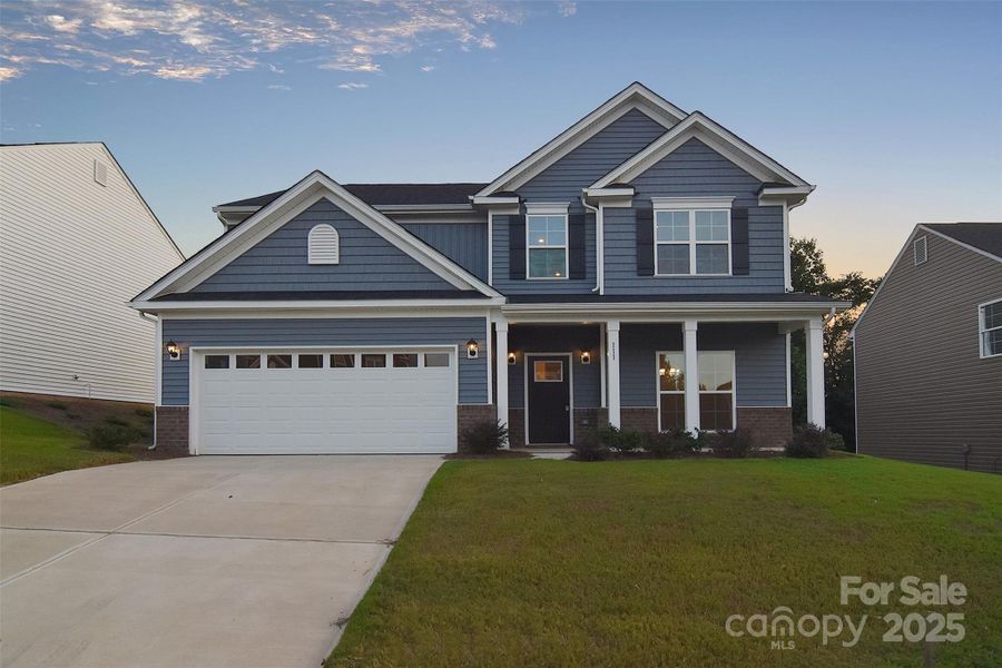 Front exterior of a new home in Larkin, Statesville, NC, highlighting curb appeal (Image 18).
