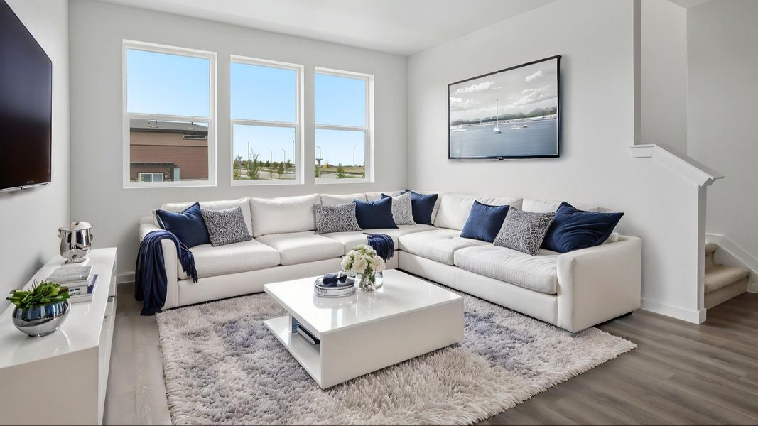 Virtually staged living area with open layout and natural light. Virtually staged living area with open layout and natural light.