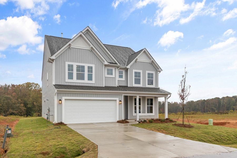 Front exterior of a new home in Monterra, Kernersville, NC, highlighting curb appeal (Image 25).