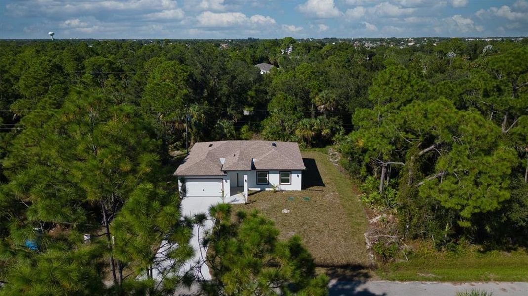 Front exterior of a new home in , Punta Gorda, FL, highlighting curb appeal (Image 2). Front exterior of a new home in , Punta Gorda, FL, highlighting curb appeal (Image 2).