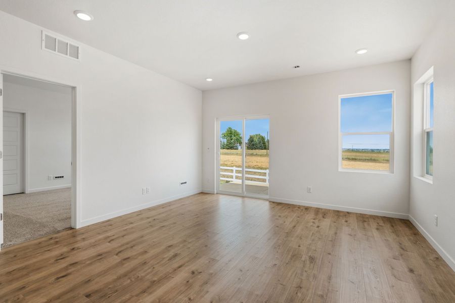 Spacious, unfurnished interior of a new home in Union Colony West, Greeley (Image 11).