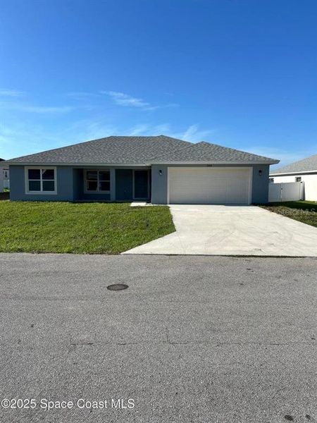 Front exterior of a new home in , Ocala, FL, highlighting curb appeal (Image 1).