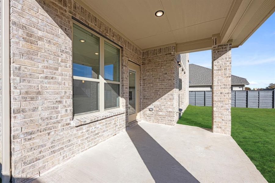 Exterior details and patio area of a home in Union Park Classic 55, Little Elm (Image 3).