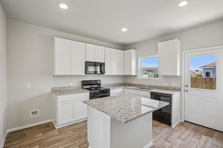 Furnished interior view inside a new home in Edgebrooke, Pflugerville (Image 6).
