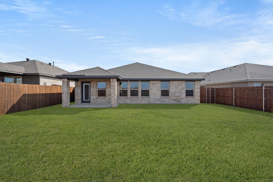 Front exterior of a new home in Baker Farms, Cleburne, TX, highlighting curb appeal (Image 27).