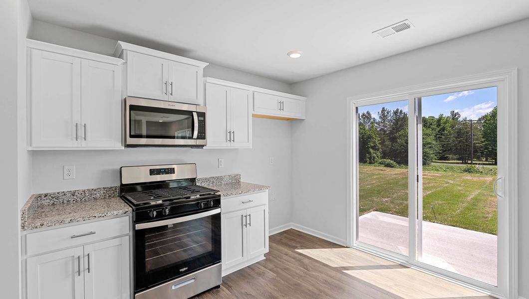 Furnished interior view inside a new home in Tyger Pines, Moore (Image 12).