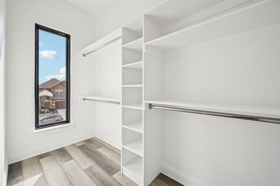 Upstairs front-facing guest bedroom's large walk-in closet.