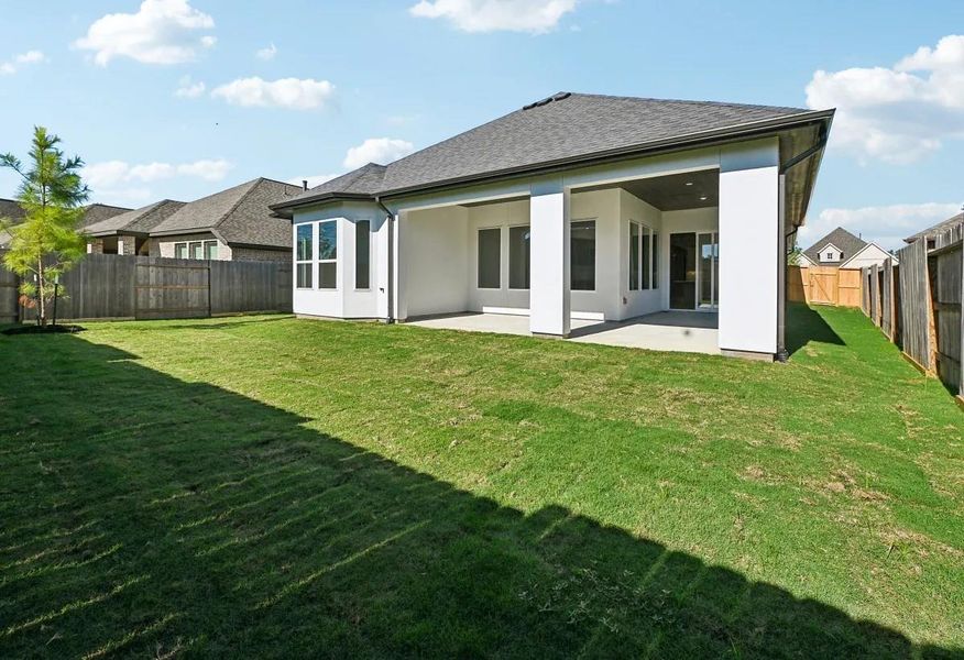 Exterior details and patio area of a home in Evergreen 50', Conroe (Image 3).