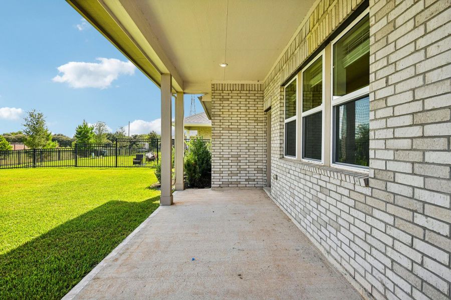 Exterior details and patio area of a home in Sunterra, Katy (Image 28). Exterior details and patio area of a home in Sunterra, Katy (Image 28).