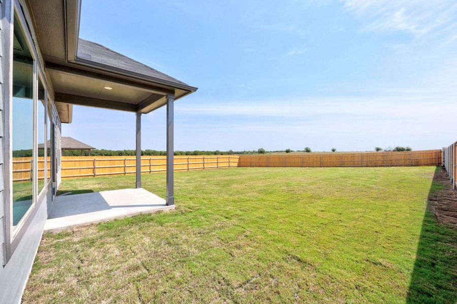 Exterior details and patio area of a home in Prairie Winds, Hutto (Image 3). Exterior details and patio area of a home in Prairie Winds, Hutto (Image 3).
