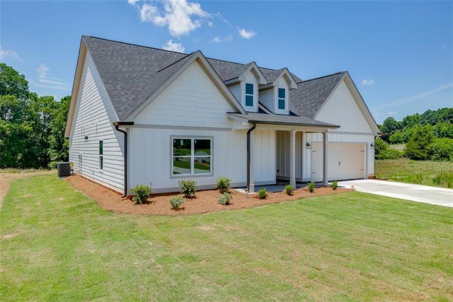 Front exterior of a new home in , Hartwell, GA, highlighting curb appeal (Image 19).