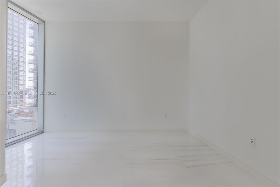 Spacious, unfurnished interior of a new home in Aston Martin Residences, Miami (Image 20).