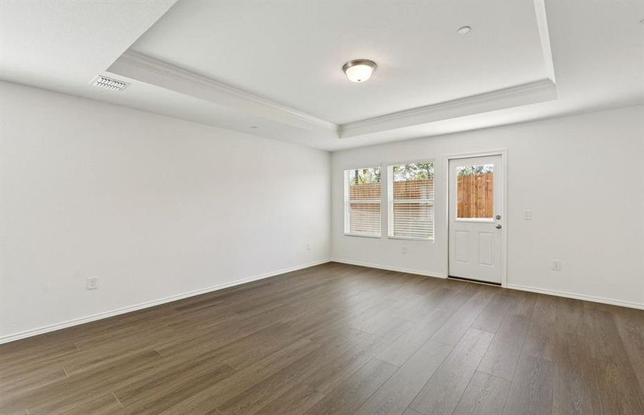 Light-filled gathering room with access to backyard Light-filled gathering room with access to backyard