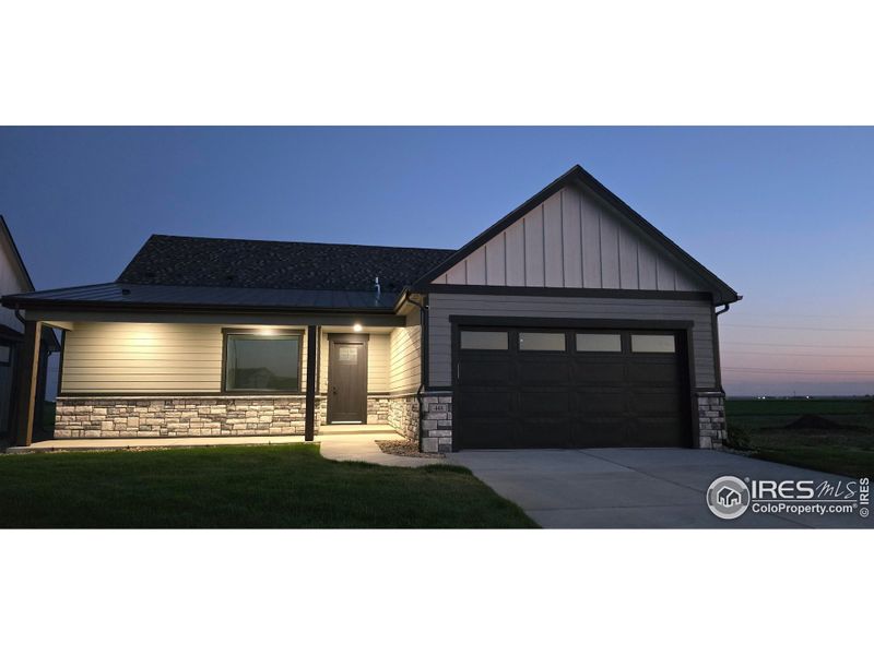 Front exterior of a new home in , Fort Morgan, CO, highlighting curb appeal (Image 1). Front exterior of a new home in , Fort Morgan, CO, highlighting curb appeal (Image 1).