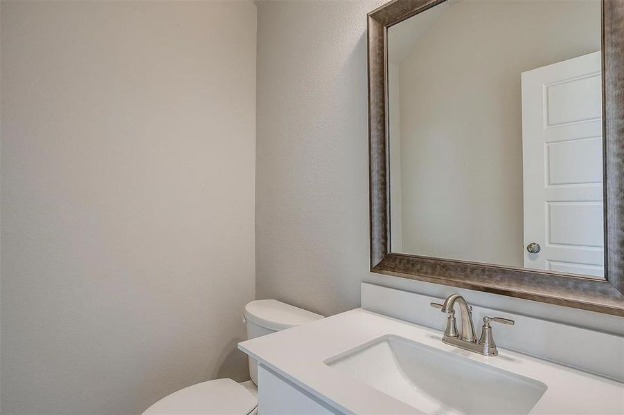 Bathroom with vanity and toilet