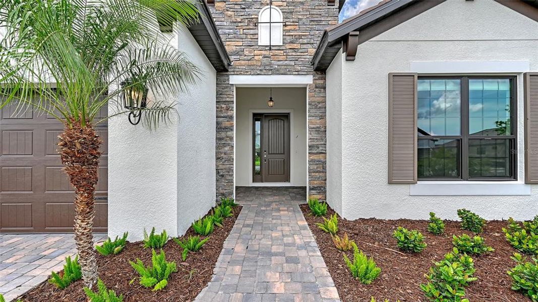 Exterior details and patio area of a home in Vistera of Venice, Nokomis (Image 3).